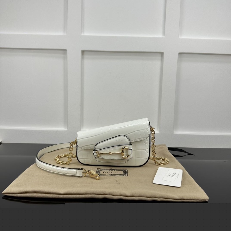 G*u*i top handle bags